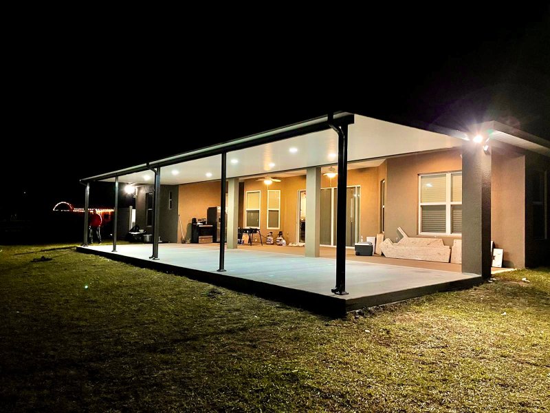 patio cover on home at night