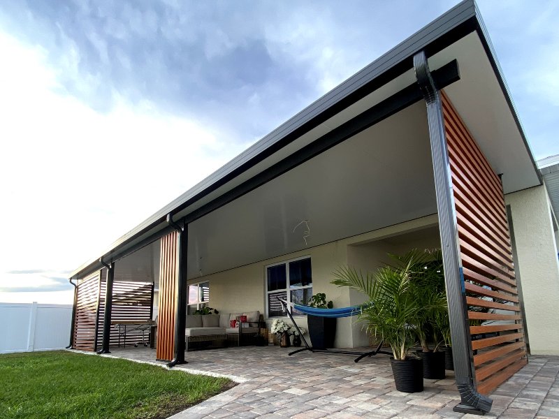 up close view of pergola with plants and hammock